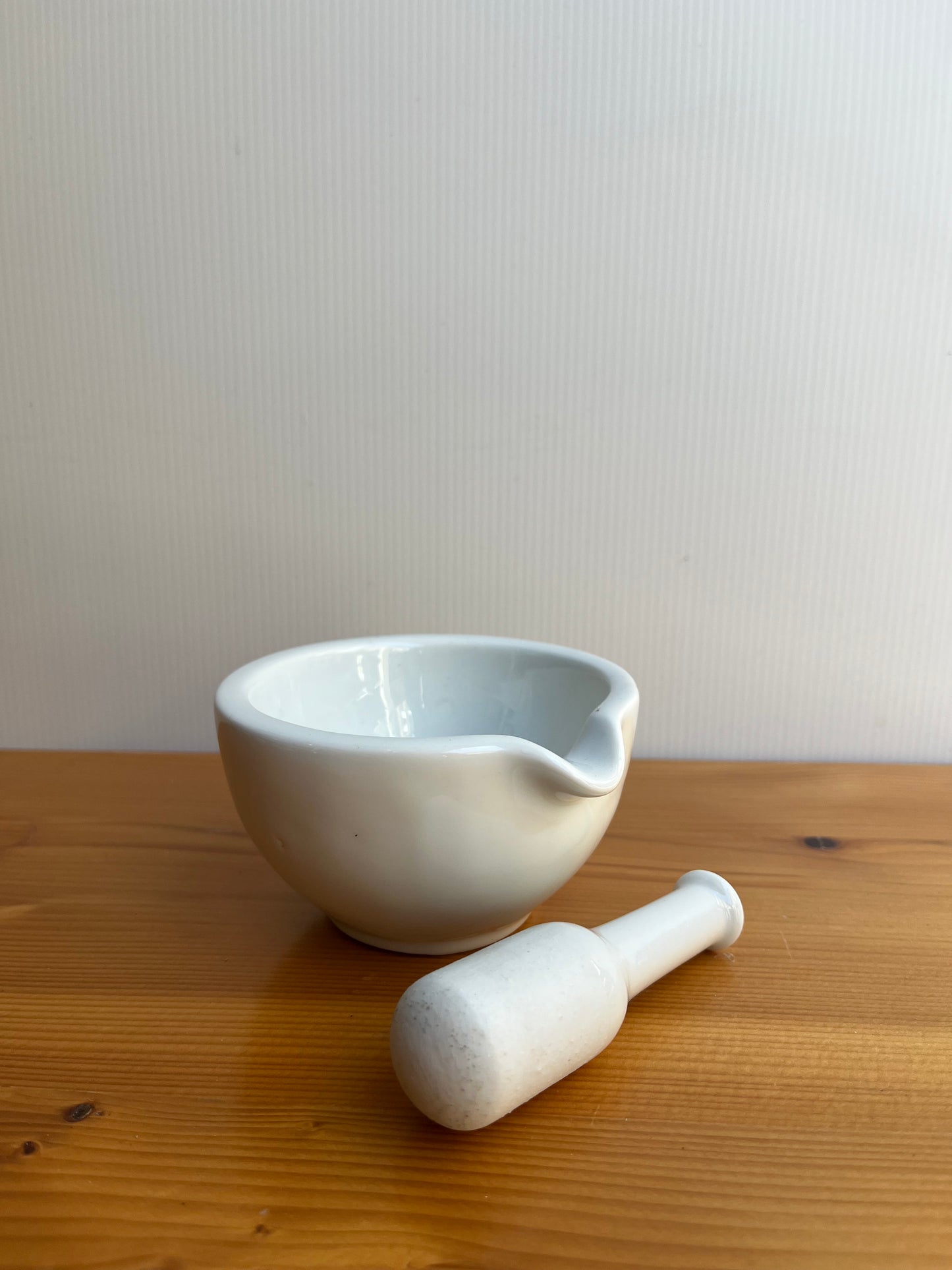 Petit pilon mortier en porcelaine