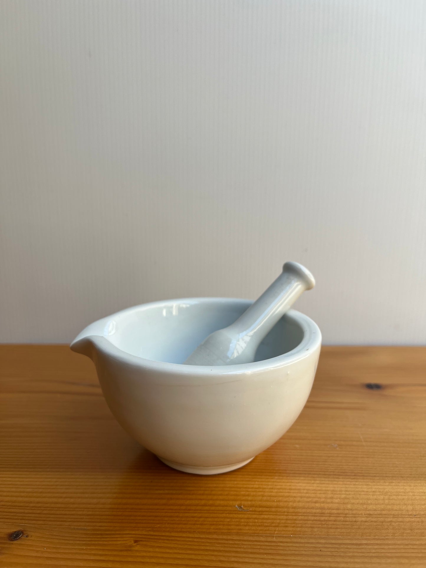 Petit pilon mortier en porcelaine
