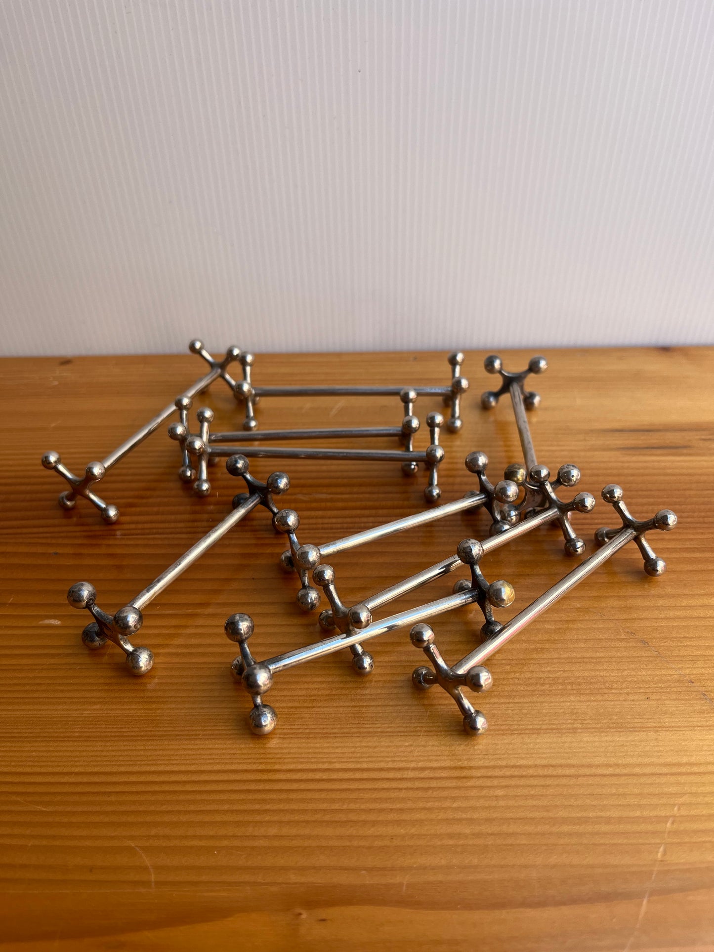 Lot de 10 porte couteaux en métal argenté