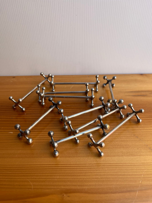 Lot de 10 porte couteaux en métal argenté