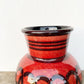 Vase en céramique rouge signé