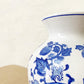 Vase boule fleurs bleues